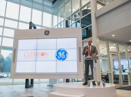 Clemson University President Jim Clements presents at the new Additive Manufacturing Lab in Greenville, South Carolina.